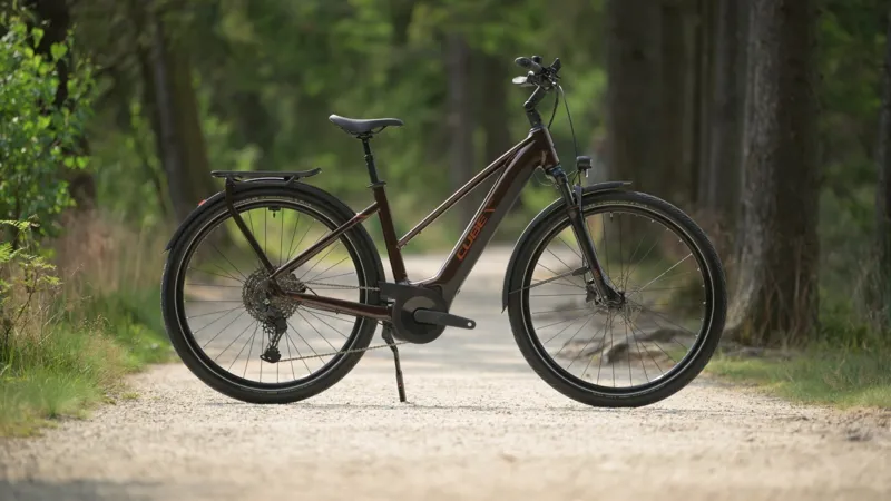 Cube Touring Hybrid Pro 625 Trapeze Electric Bike 2025 Cinnamon/Orange-1